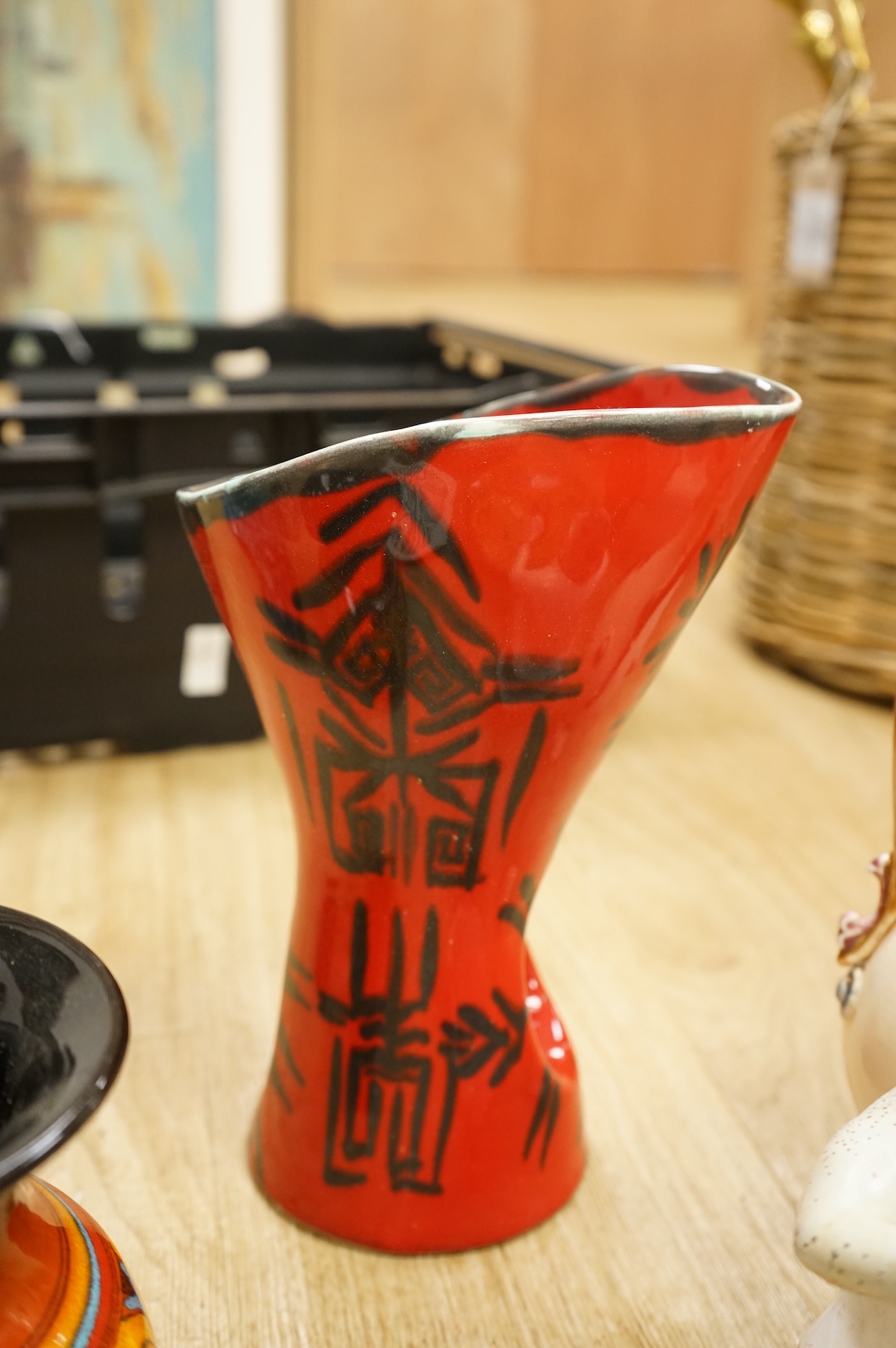 A collection of studio ceramics and pottery to include a Zsolnay vase and a Lyn Alves hexagonal dish